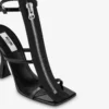 High-heeled patent leather sandals