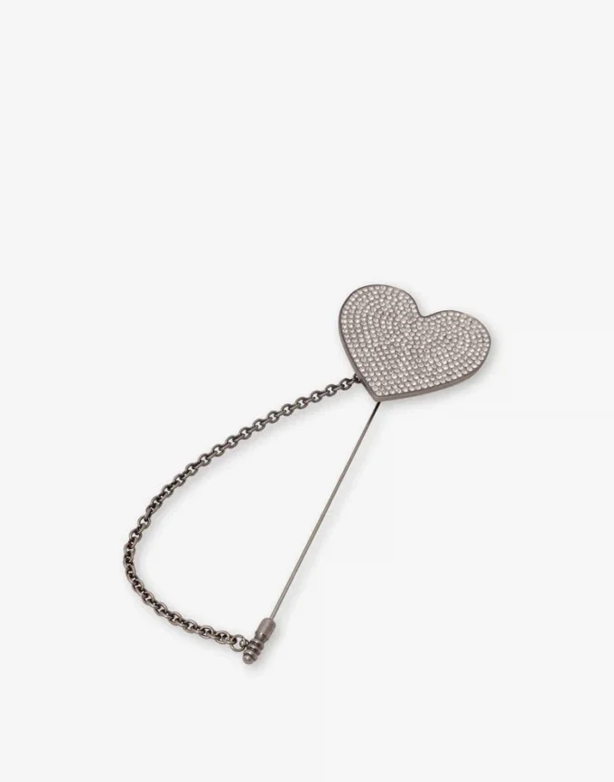 Metal brooch with rhinestones