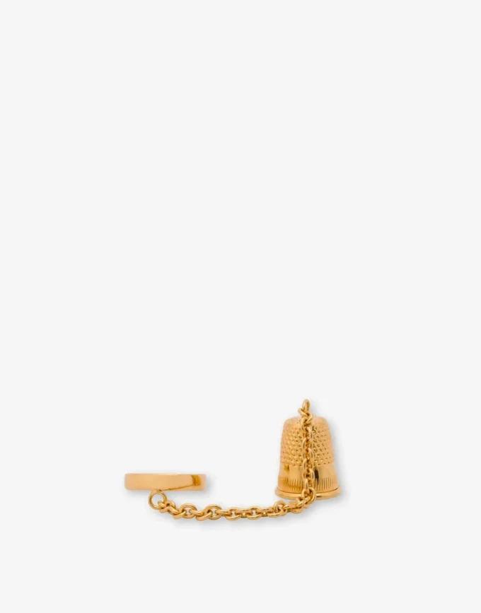 Metal ring with charm