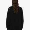 Oversized pullover in carved wool